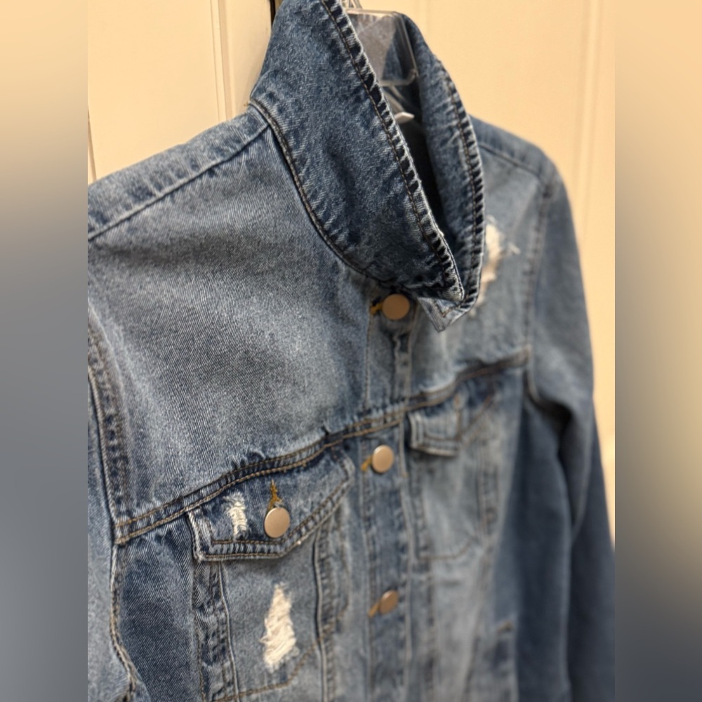 BP denim jacket, size Med Jacket has distressed details.